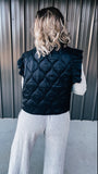 Black Quilted Ruffle Vest