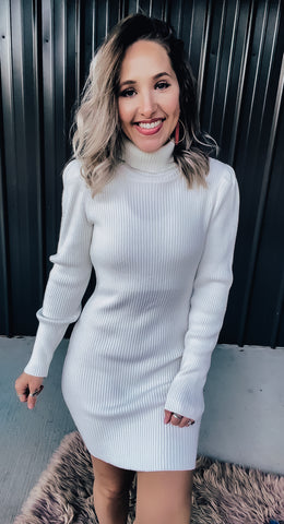 ivory sweater dress Always Chic Long Sleeve Forgiving fit High quality soft knit Also available in Kelly Green and Barbie Pink Model is Mirth Jackson Ivory Sweater Dress